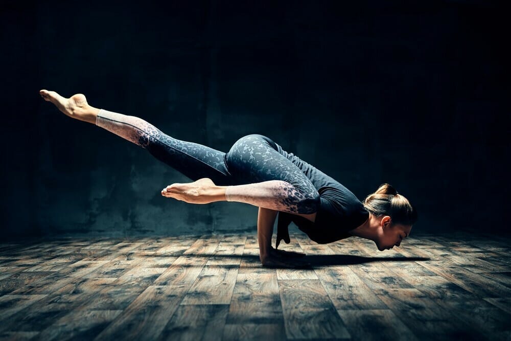 6 Yoga Arm Balances To Challenge Your Center Of Gravity